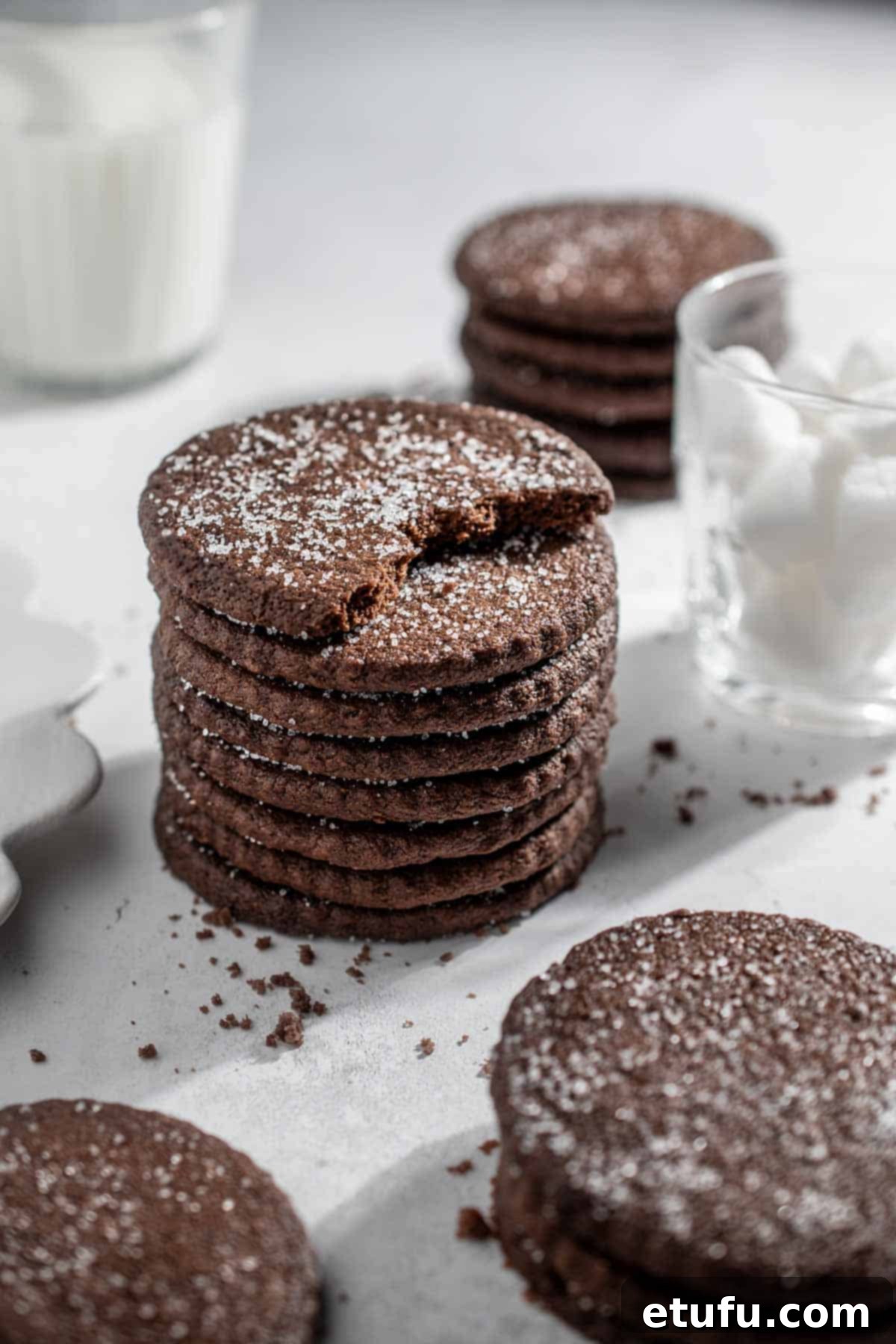 A stack of chocolate shortbreads on a white background.