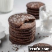 A stack of chocolate shortbreads on a white background.