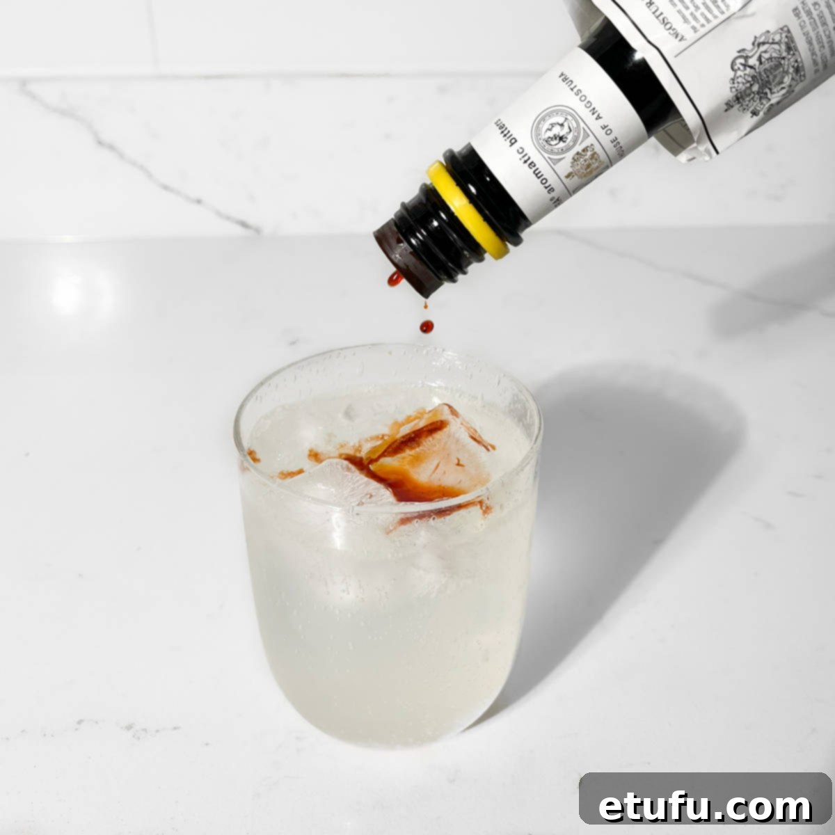 Adding angostura bitters to lemon lime bitters.