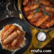 Ultimate Devilled Sausages 15 Devilled sausages in a bowl with mash, next to a pan of devilled sausages.