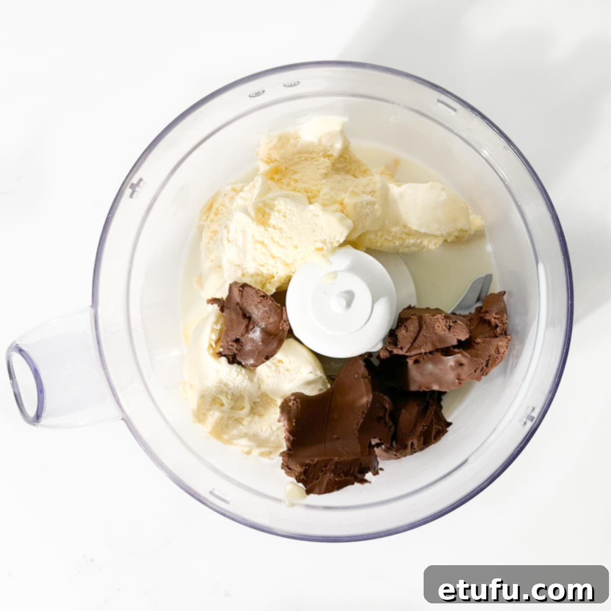 Nutella Milkshake Magic: Only 3 Ingredients 4 Adding all the ingredients to a food processor.
