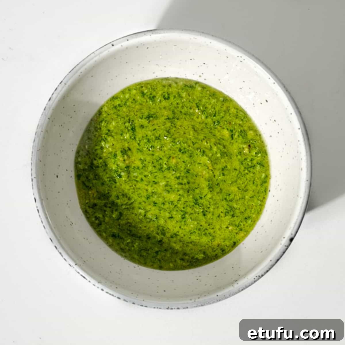 Rocket pesto in a small bowl.