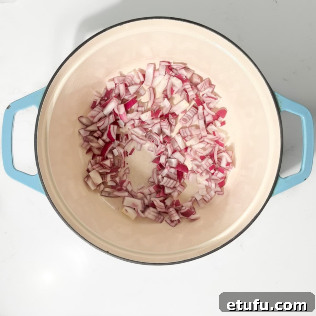 Frying the onions for the chicken karahi.