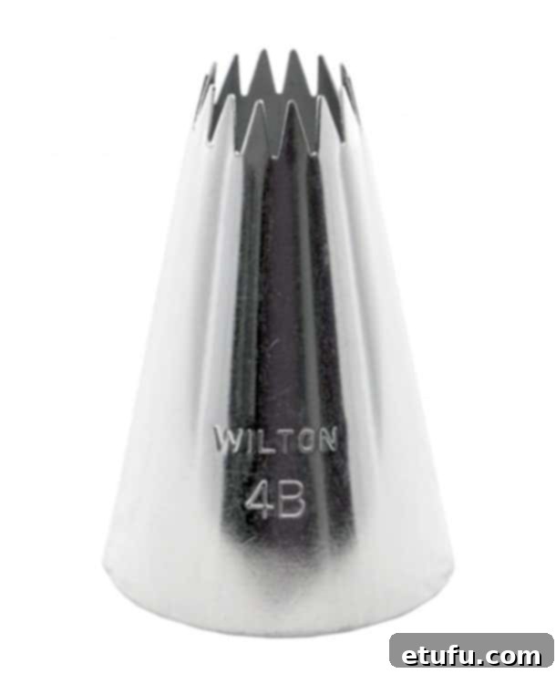 Close-up of a Wilton 4B open star piping tip, ideal for creating beautiful butter rosettes.