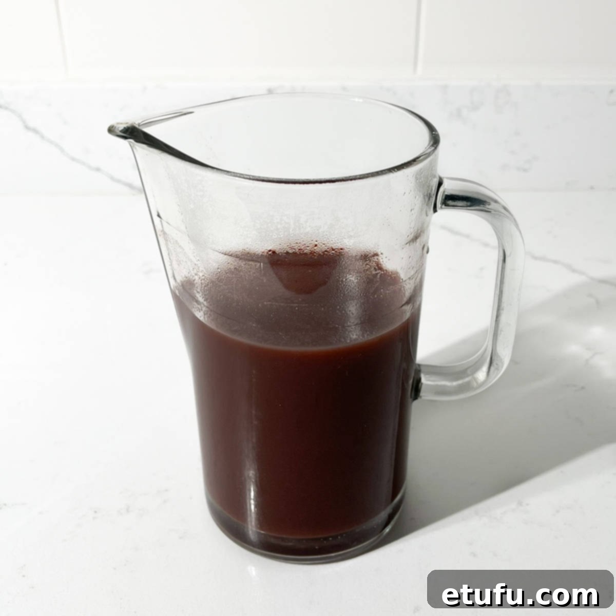 The sauce for the trinchado mixed in a large jug.