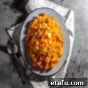 Creamy Carrot and Swede Mash 6 Carrot and swede mash on an oval plate.