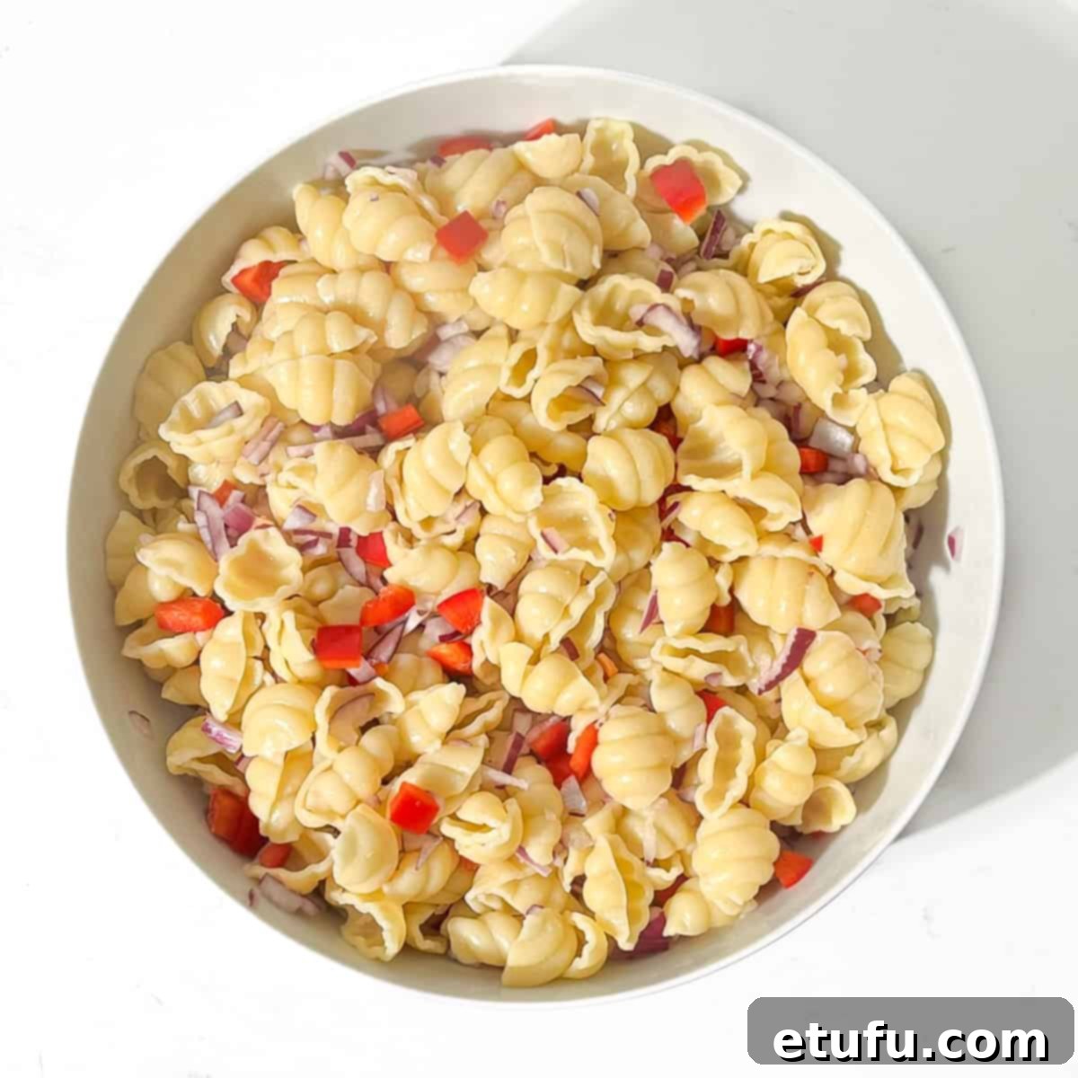 Veggies mixed into the cooked pasta.