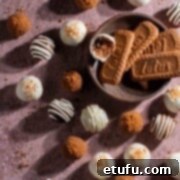 Biscoff truffles decorated in various ways on a mauve background.