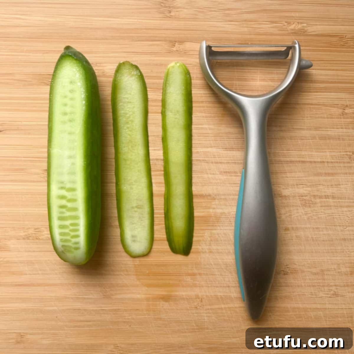 Cutting cucumber ribbons with a peeler for sushi salad.