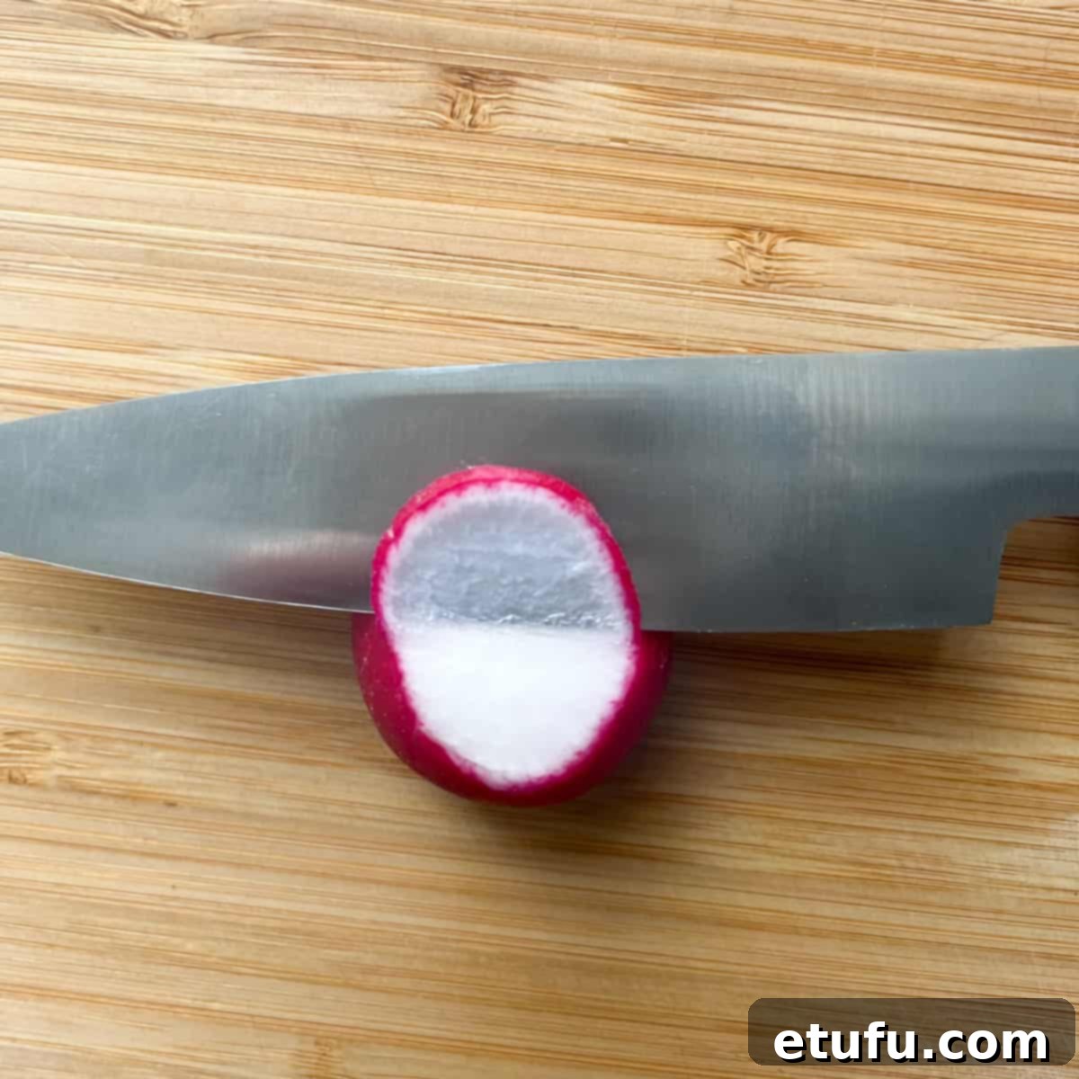 Cutting wafer thin radish slices for the sushi salad.