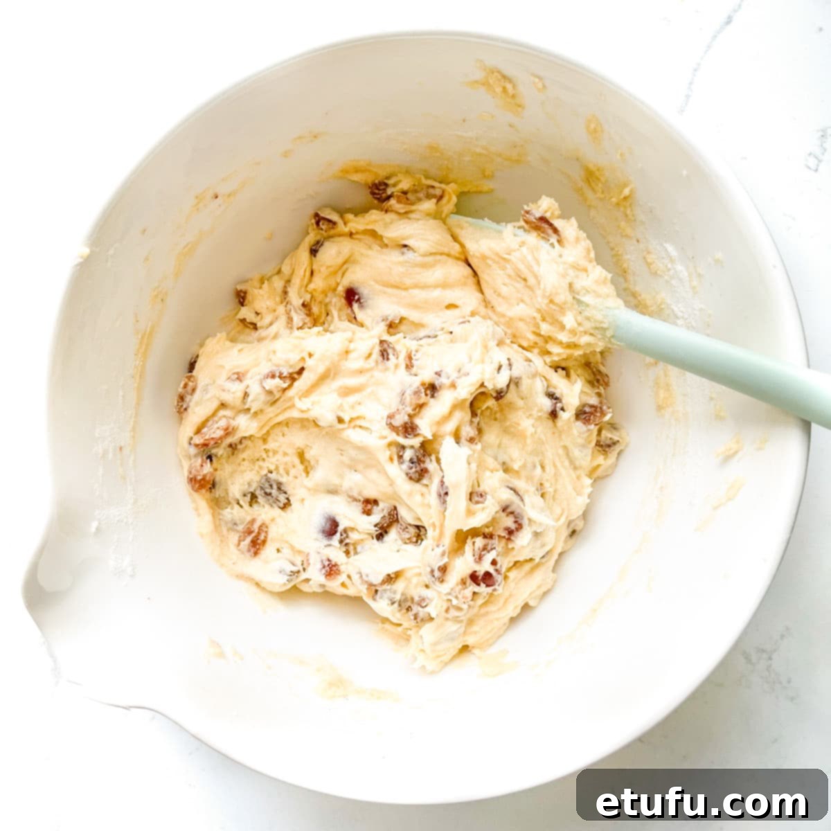 The finished sultana cake batter, with all the fruit gently folded in and evenly distributed.