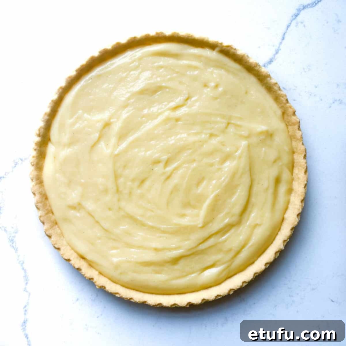 Exquisite French Fruit Tart 38 A pastry case filled with creme pattisiere.