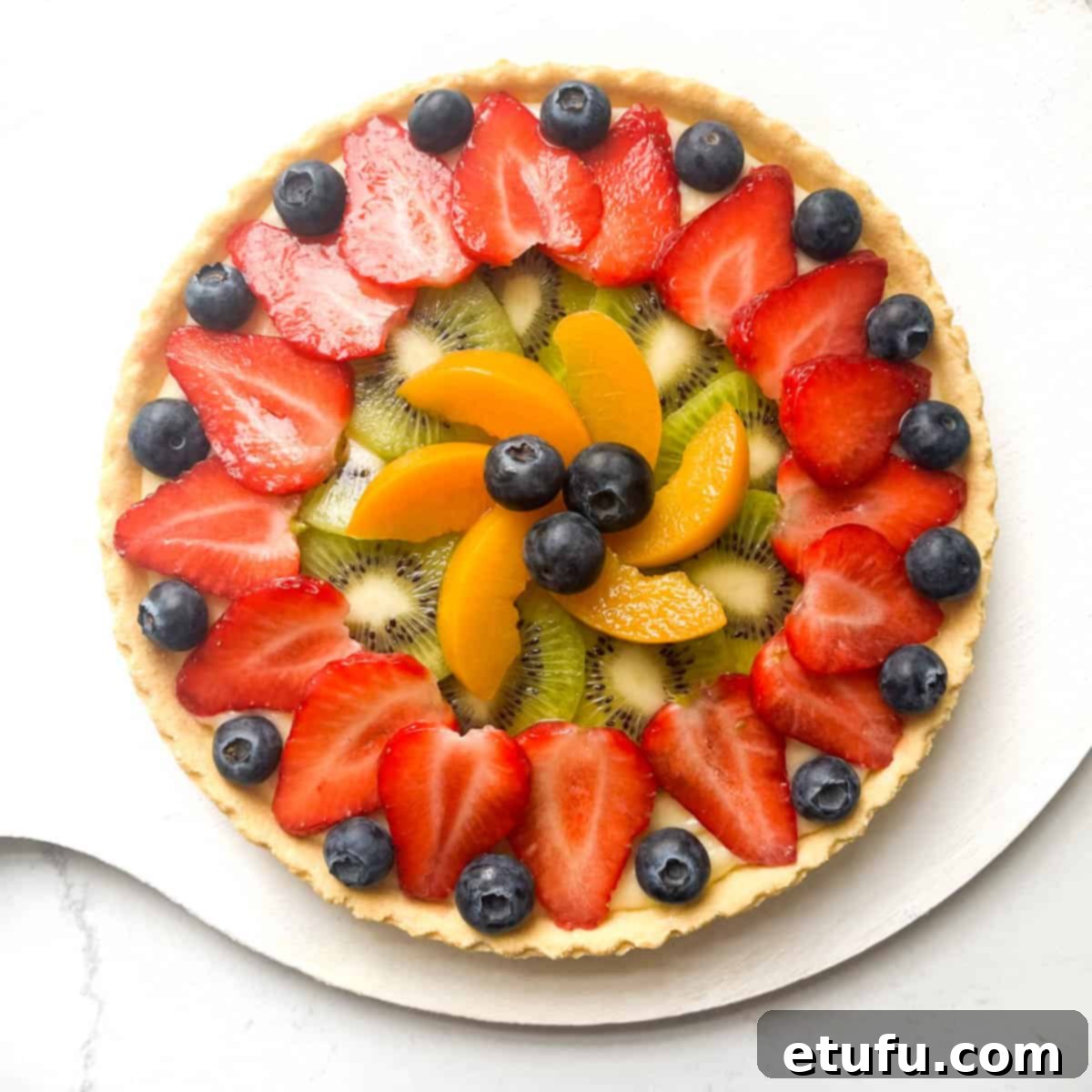 Exquisite French Fruit Tart 39 A completed tarte aux fruits tart without the gloss mixture painted on.