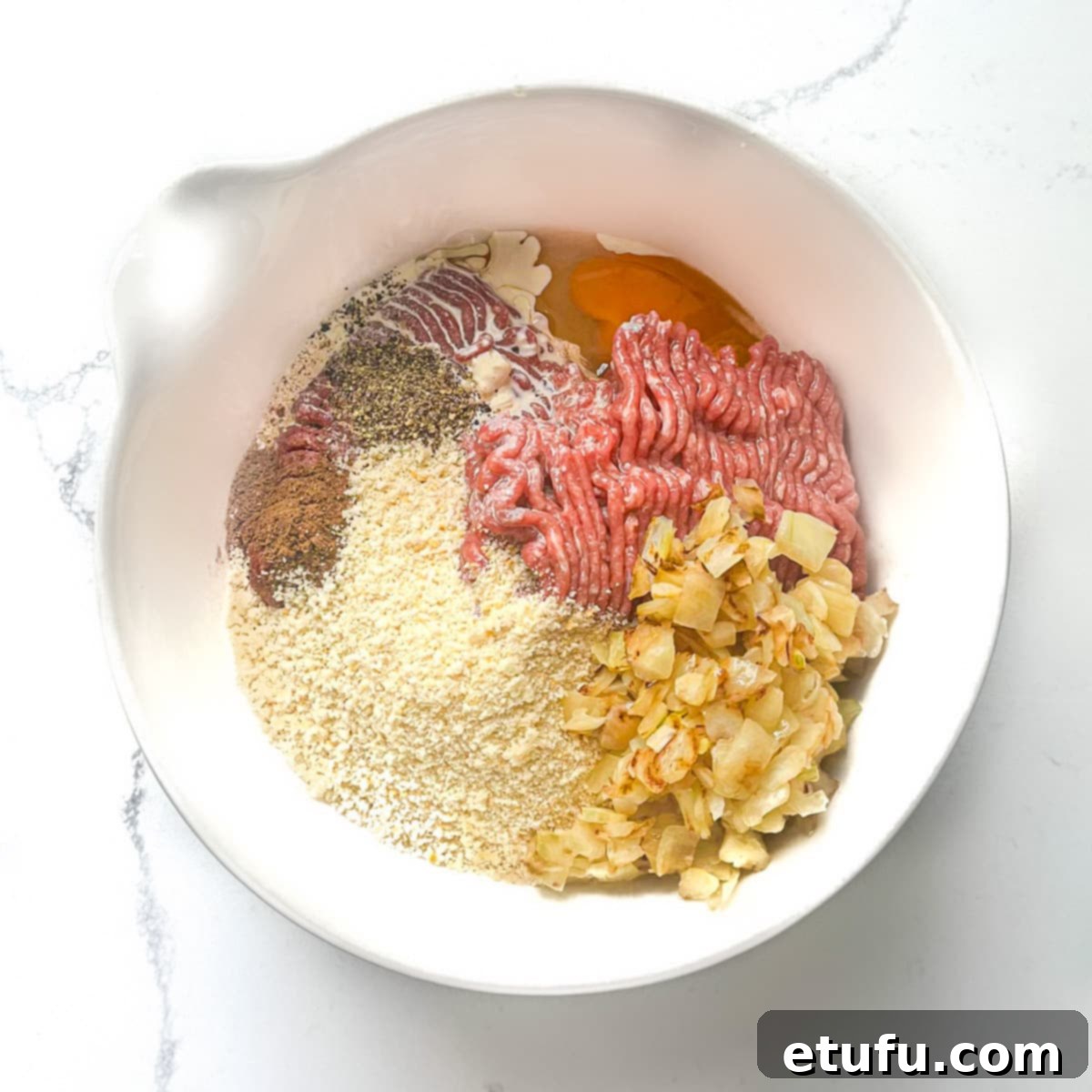 All ingredients for lihapullat in a large white mixing bowl.