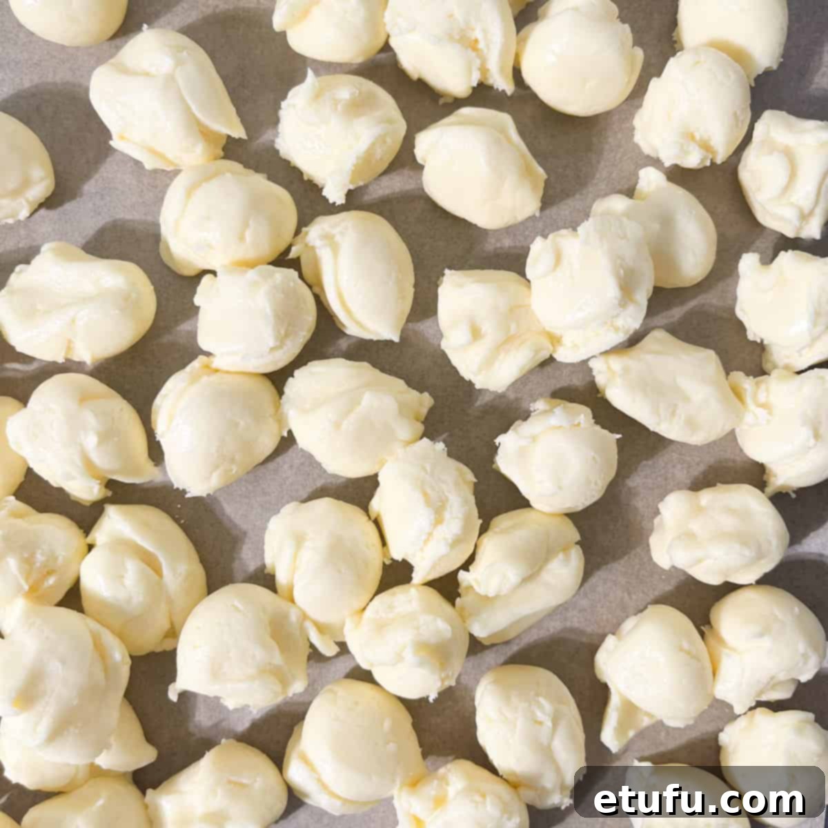 Pieces of measured out sequilho dough, ready to be rolled into balls.