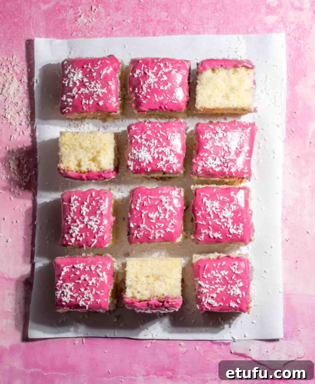 Tottenham cake squares on a pink background.