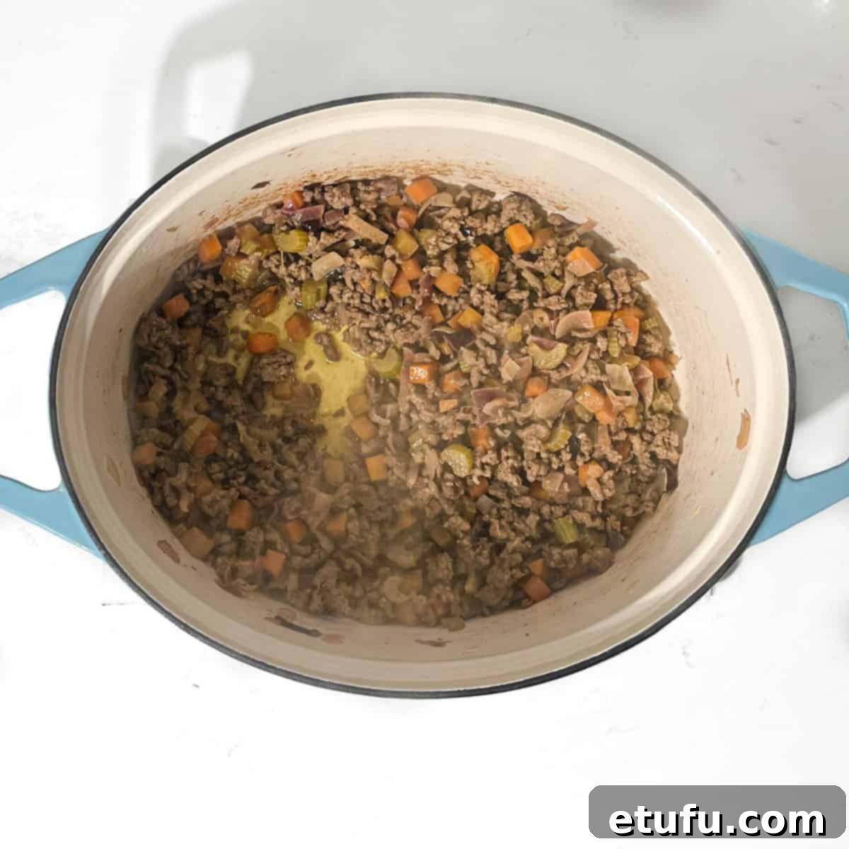 Browned mince in a large pot.