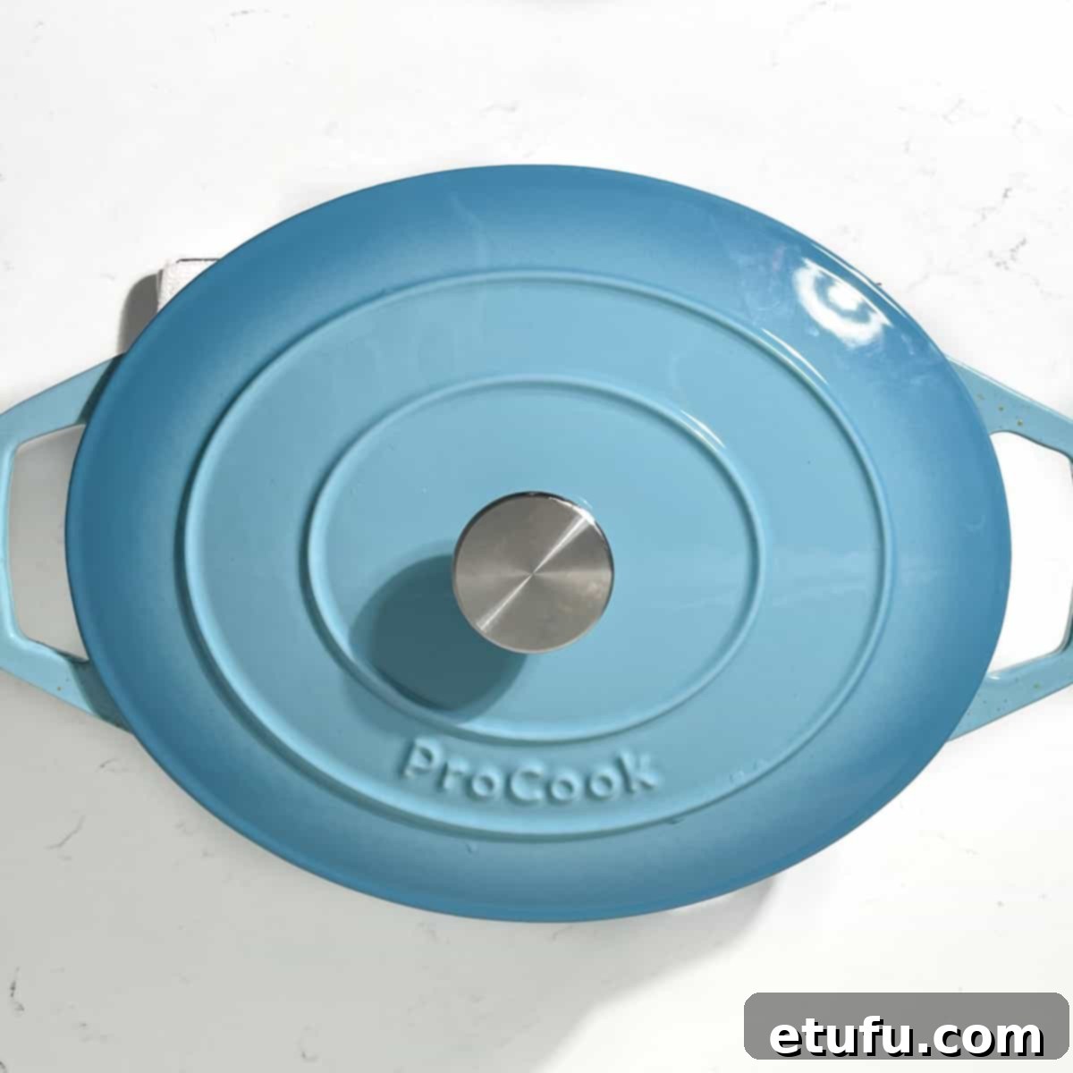 A large pot tightly fitted with a lid.