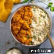 Chicken handi and rice on a blue background with a mustard napkin.
