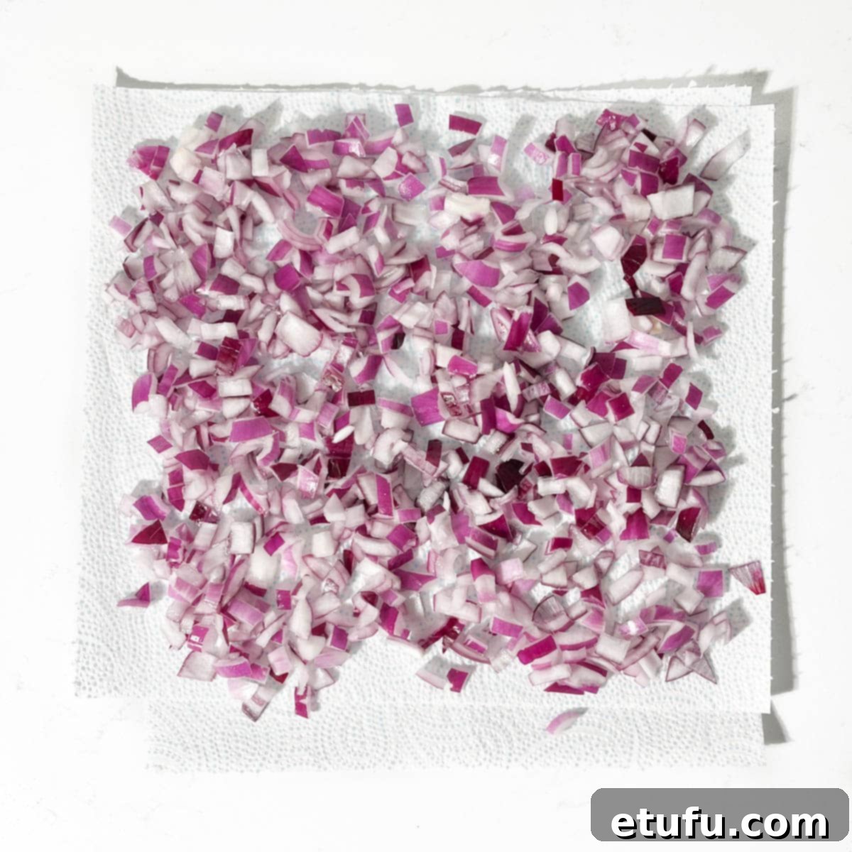 Poppadom Perfection: Indian Onion Chutney 8 Chopped onions drying on kitchen paper.