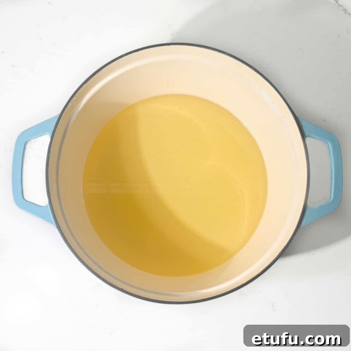 Oil in a large, deep saucepan.