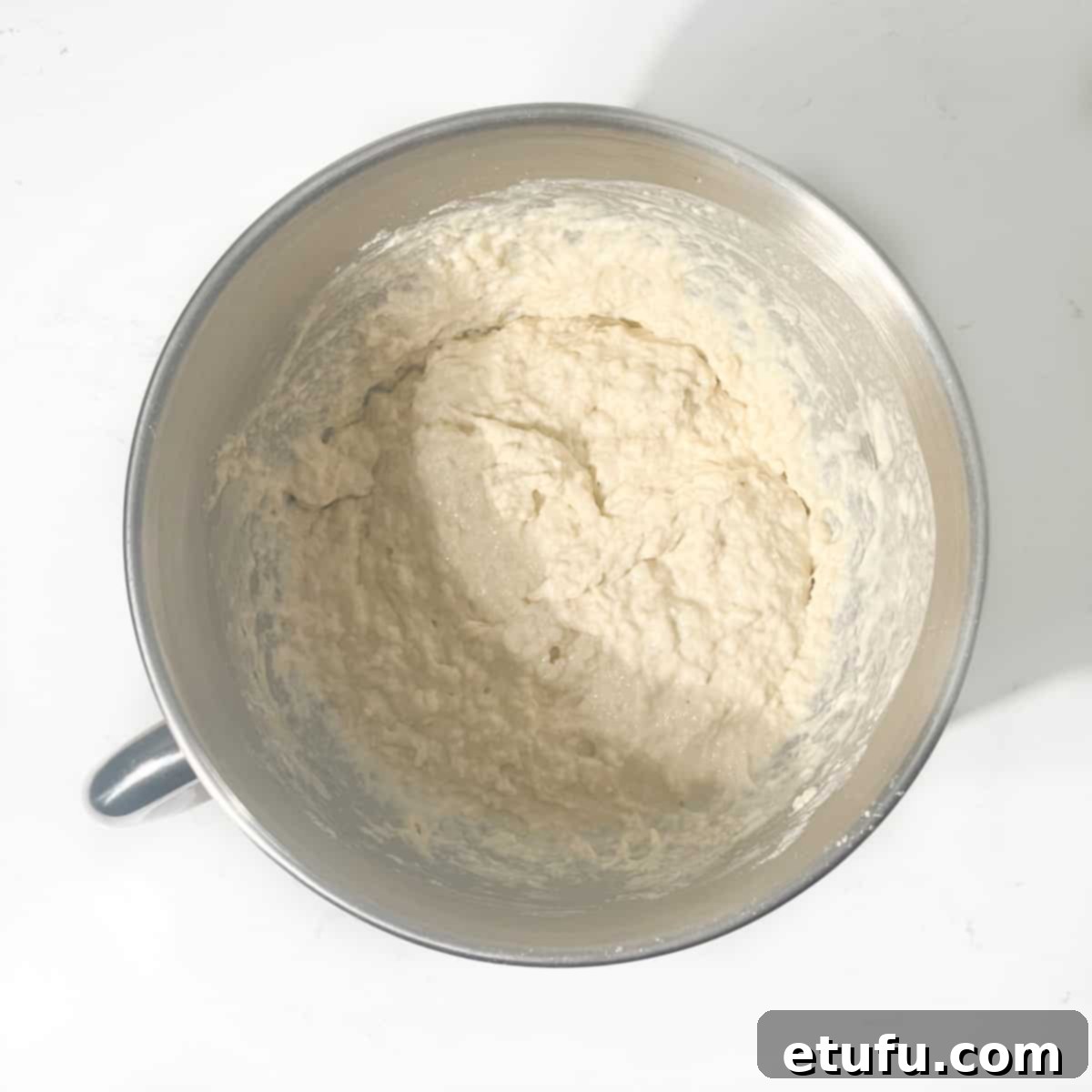 Mixed Vetkoek ingredients in a large mixing bowl.