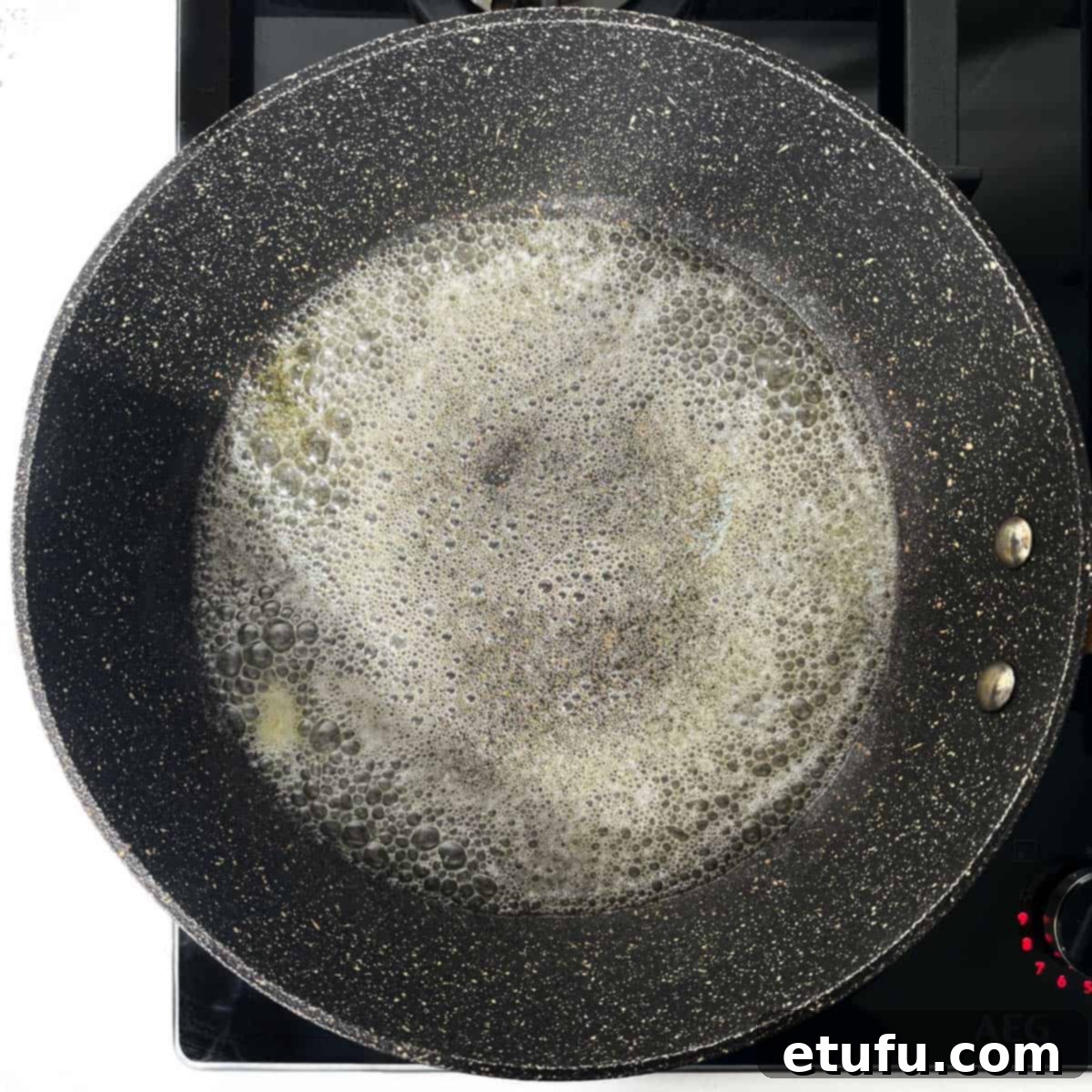 Crispy Fried Zucchini 6 Melted butter and oil in a frying pan, becoming frothy.