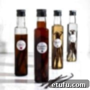 Homemade vanilla extract bottle on a white background.