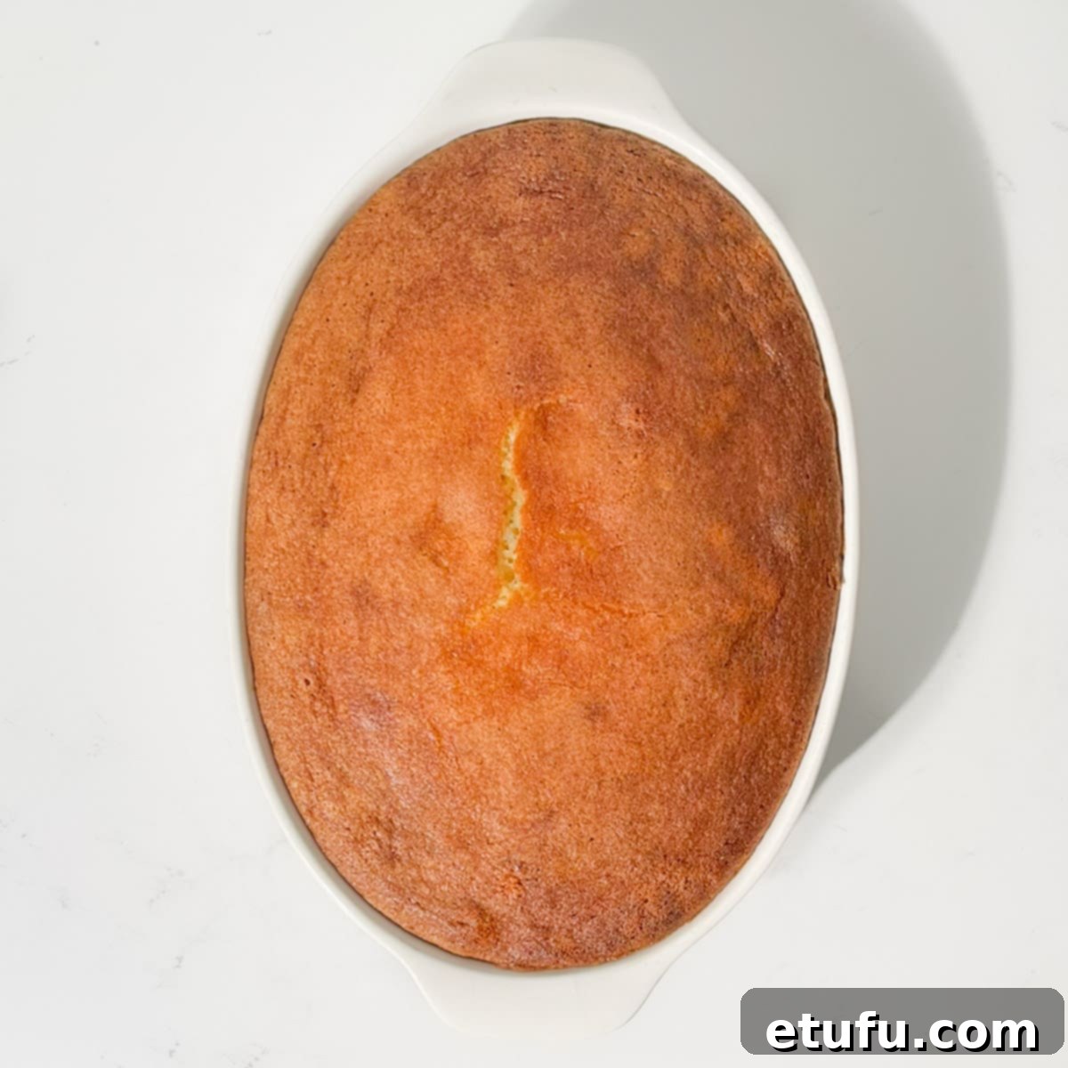 A cooked Eve's pudding.