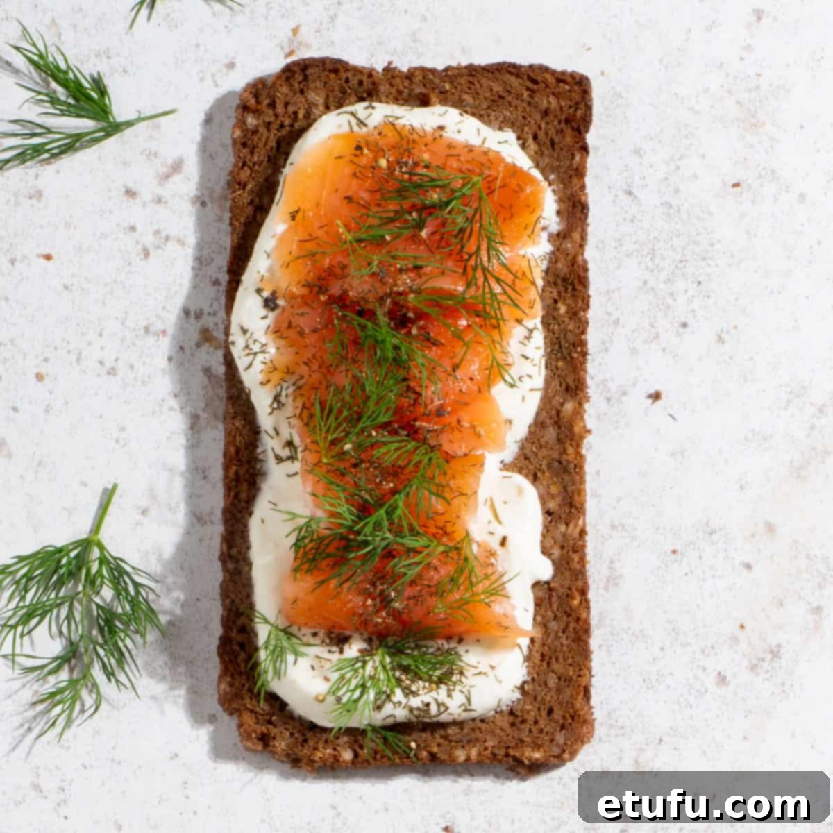 Cottage cheese toast topped with luscious smoked salmon and fresh dill sprigs.