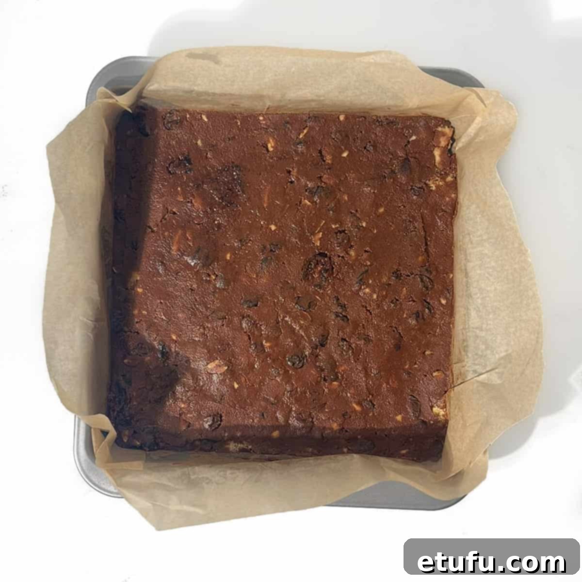 Mixture spread into the baking tin and smoothed over.