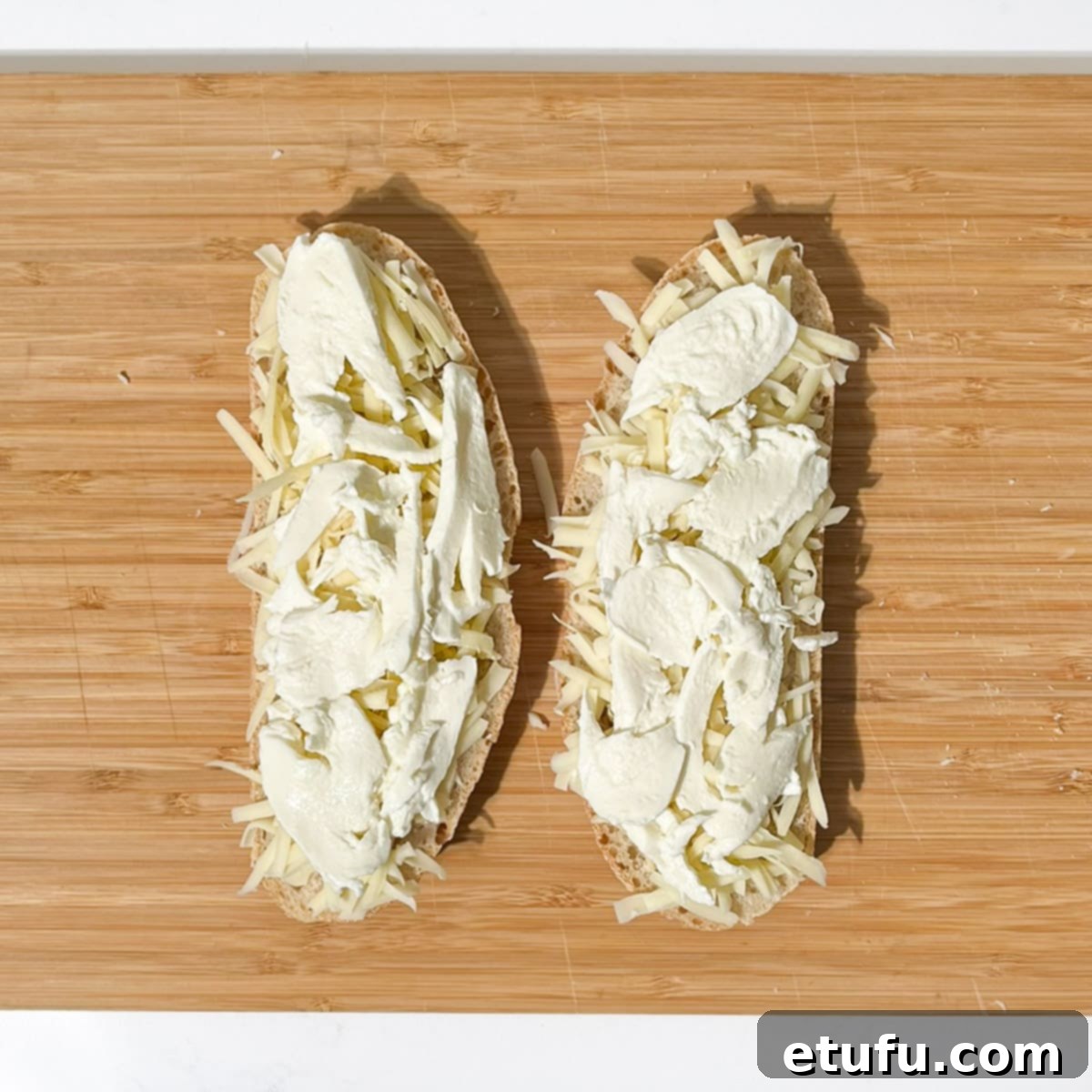 Mozzarella added on top of the Emmental cheese for the sourdough grilled cheese sandwich.