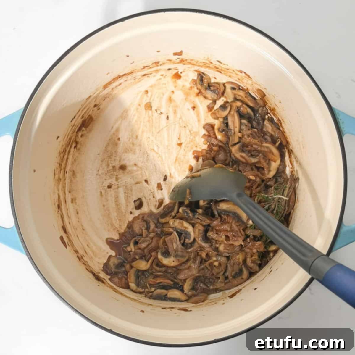 Deglazing the pan with sherry.