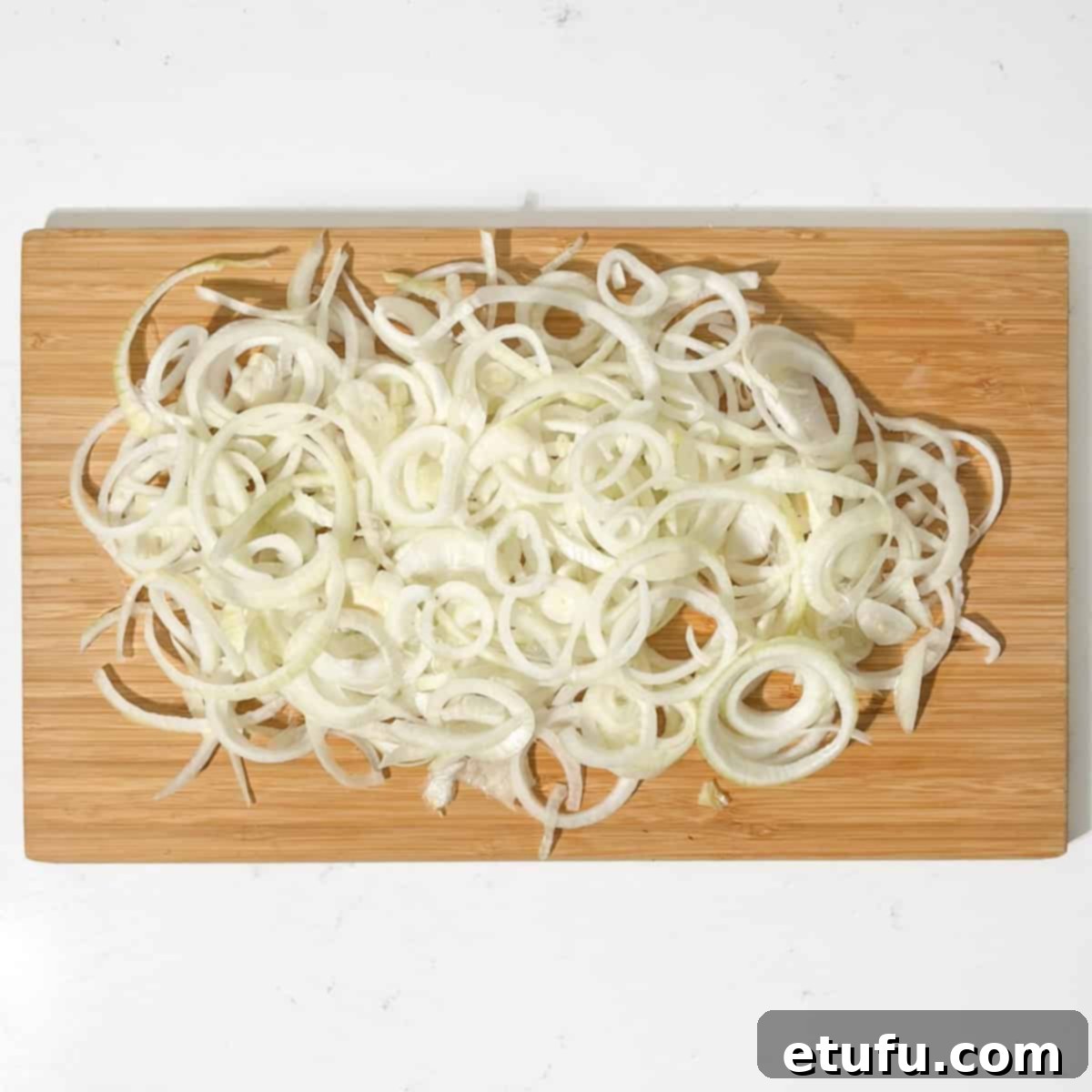 Sliced onions for the french onion pasta.