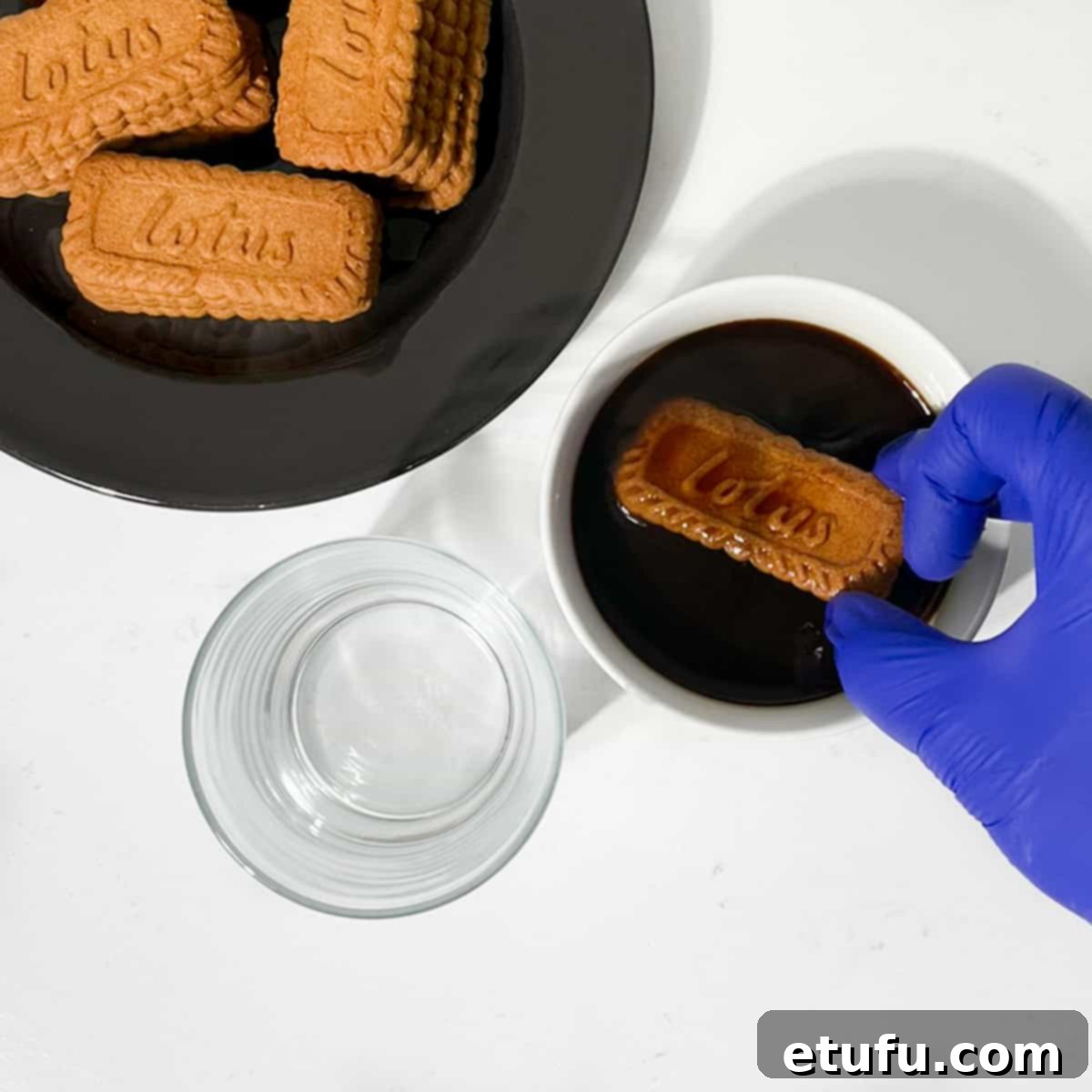 Dipping biscoff cookies in coffee.
