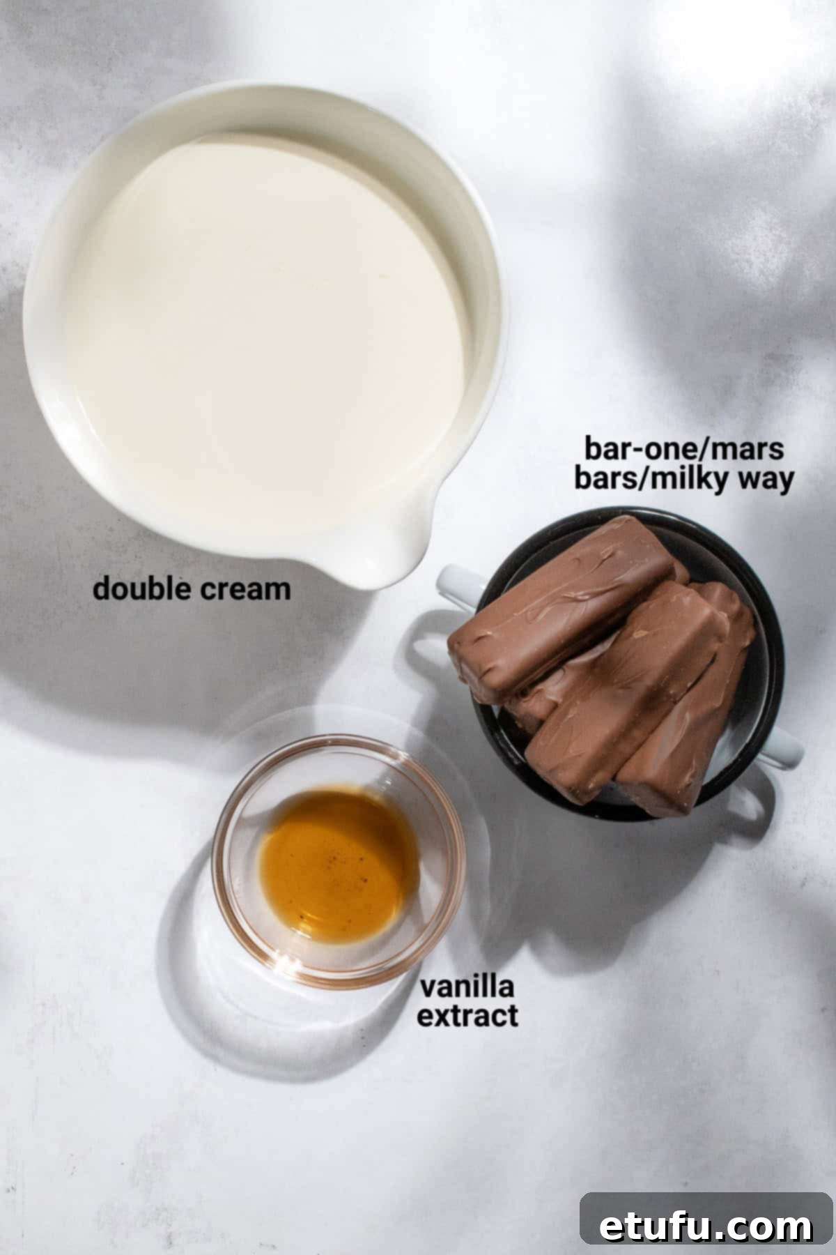 Ingredients for Bar-one sauce: chocolate bars, cream, and vanilla extract.