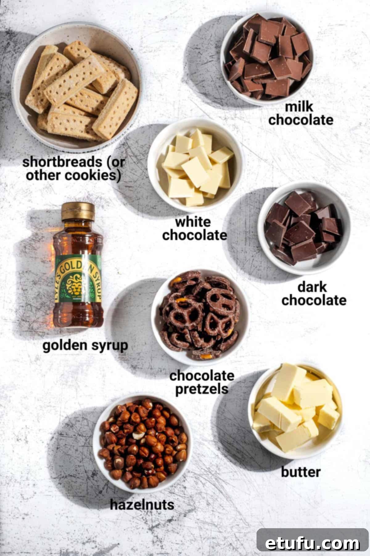 Decadent No-Bake Chocolate Biscuit Delight 3 Ingredients for the chocolate biscuit cake recipe, neatly laid out.